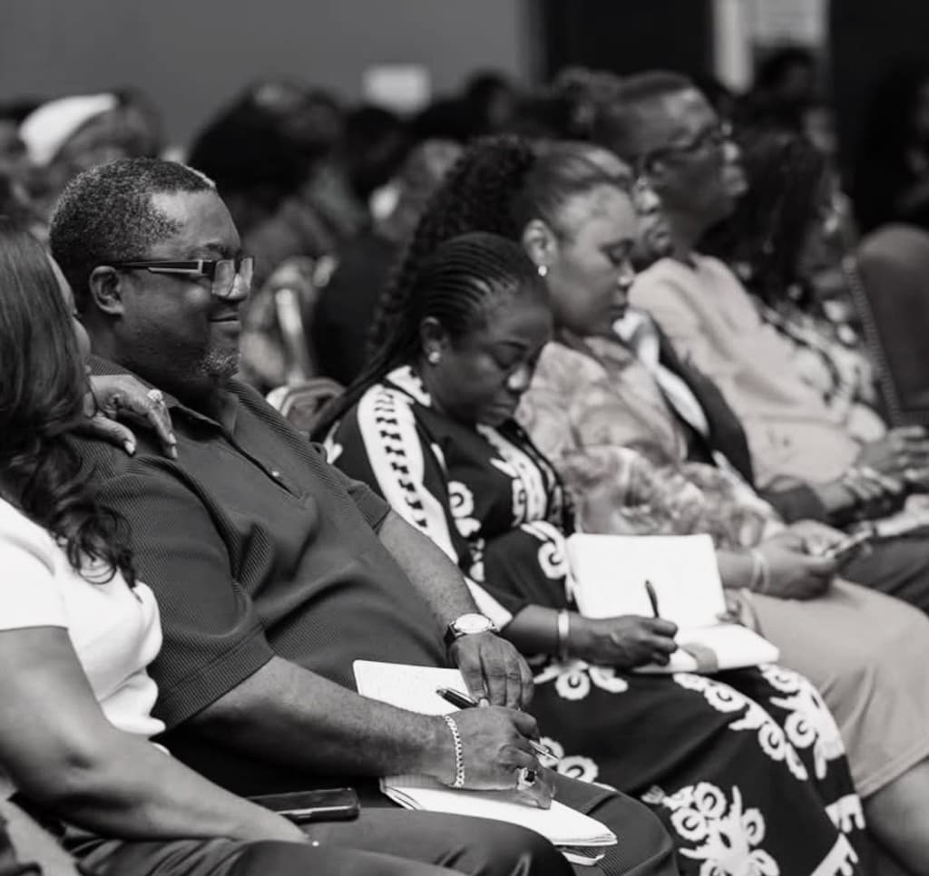 People taking notes during the teaching of God's Word